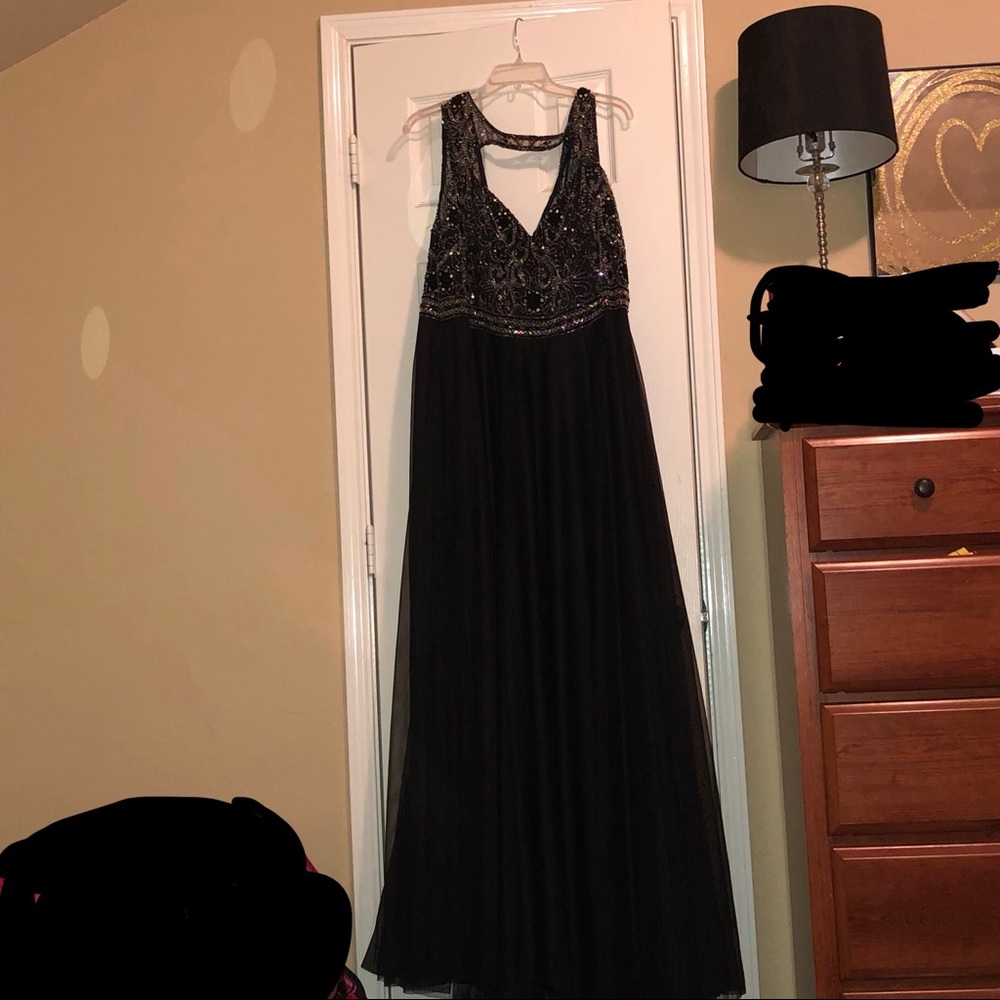 Black open neck dress with silver sequins